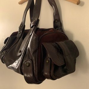 Posh purse really excellent detail for all lovers of design. Suede and patent